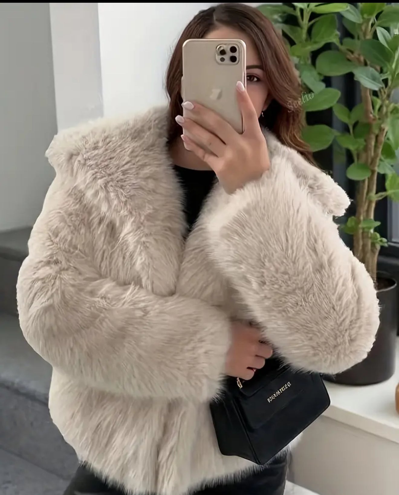 Women’s white fur coat